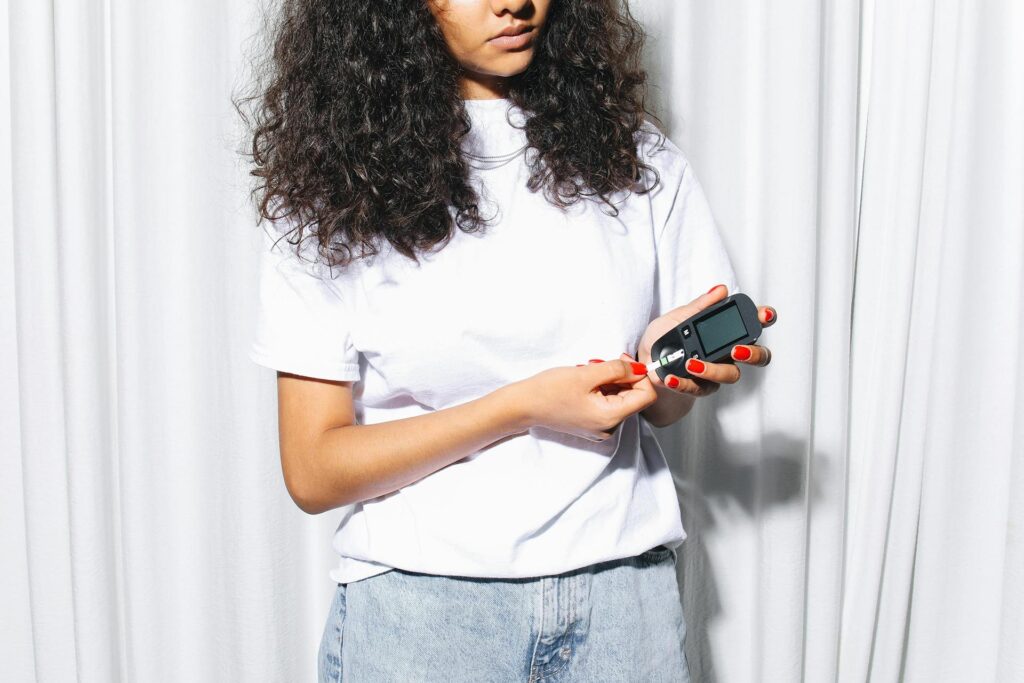 Woman checking blood sugar