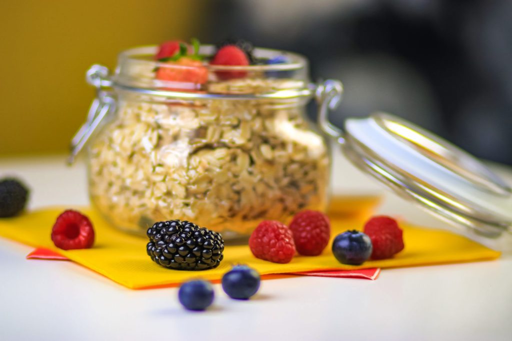 Glass jar of granola with fruit