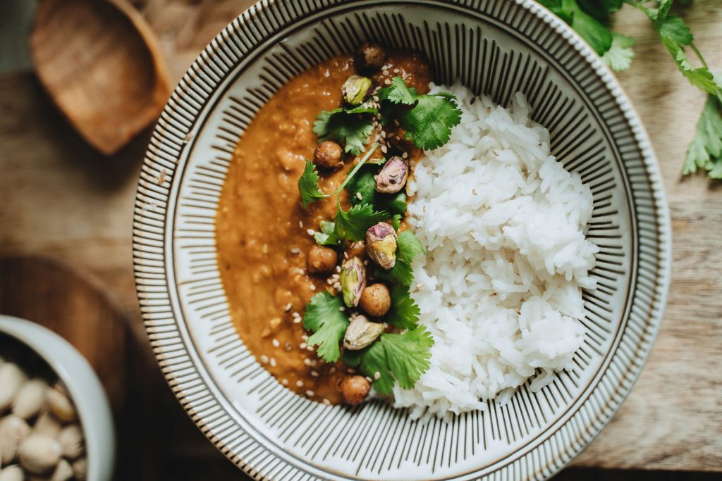Vegan rice bowl with beans and nuts